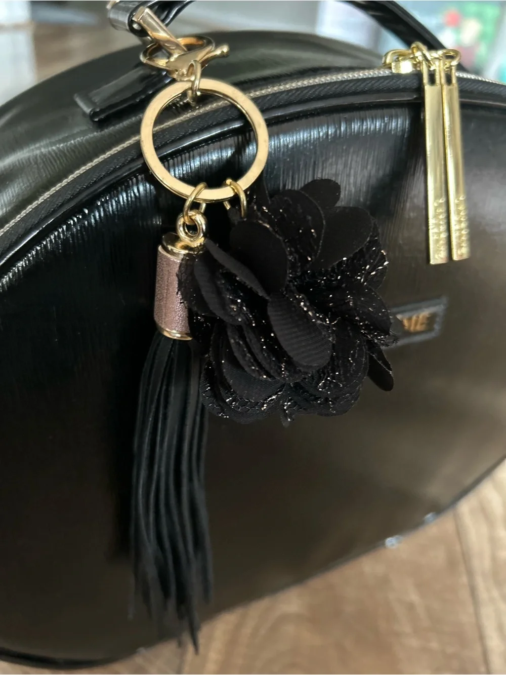 Lancôme Le Parisian Black Faux Leather Train Case Bag with Floral Tassel Charm