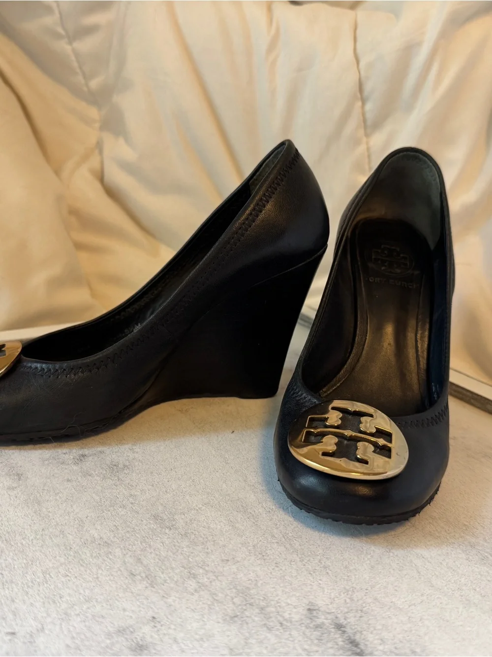 Tory Burch Black Leather Wedge Pumps with Gold Logo Medallion